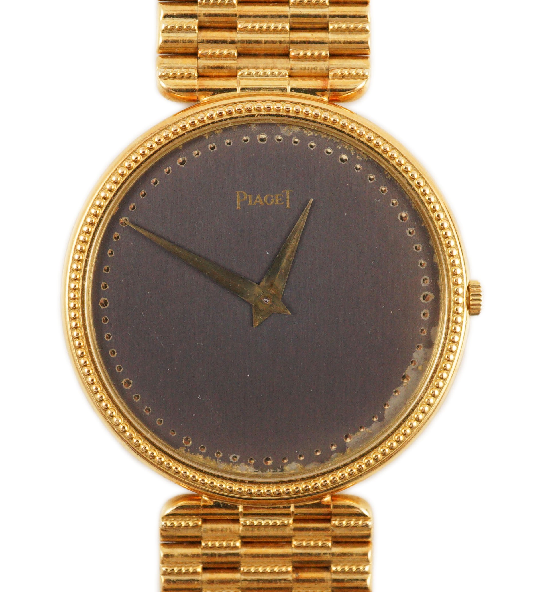 A gentleman's 18ct gold Piaget manual wind dress wrist watch, on an 18ct gold Piaget bracelet